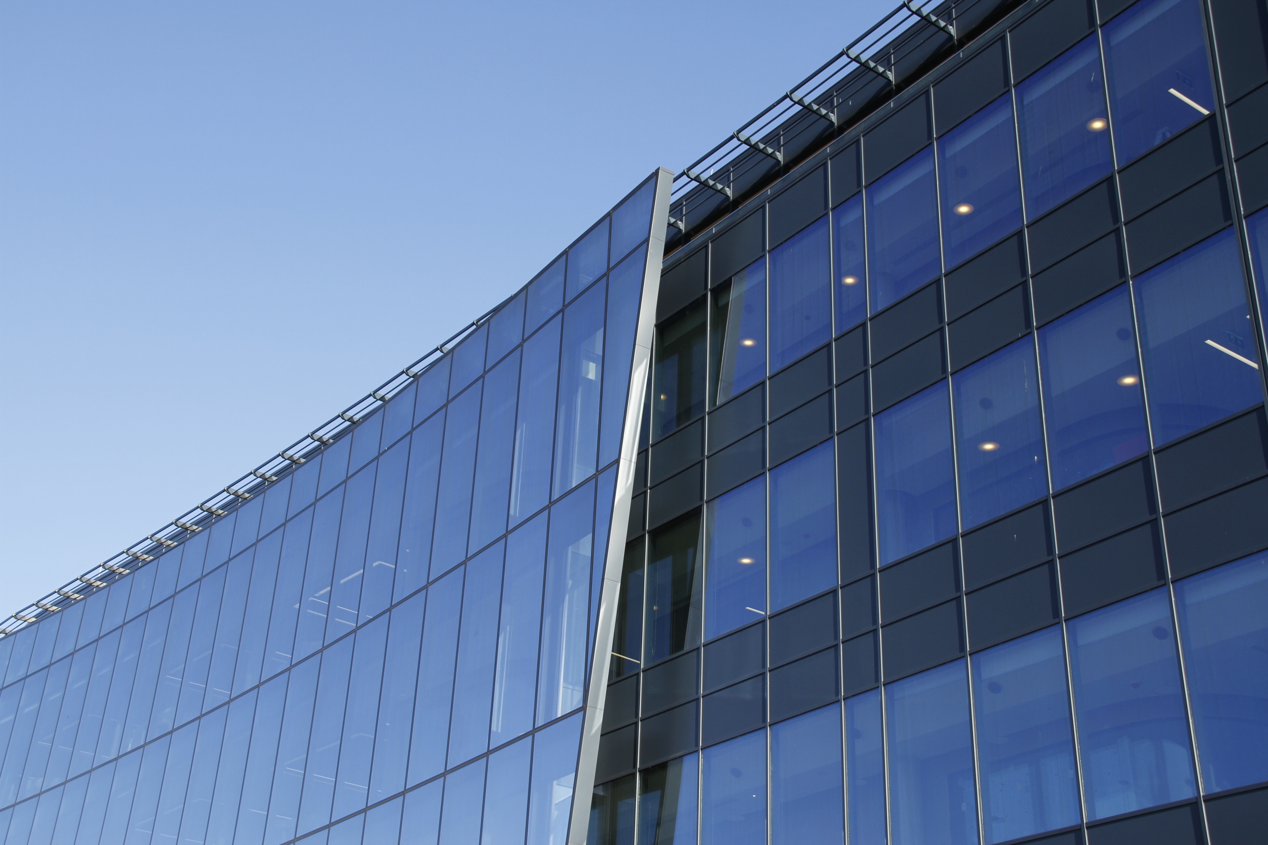 <p>Completed in 2019, One South County features a full height atrium and penthouse roof garden, as well as floor to ceiling windows extending around all sides of the striking building.</p>